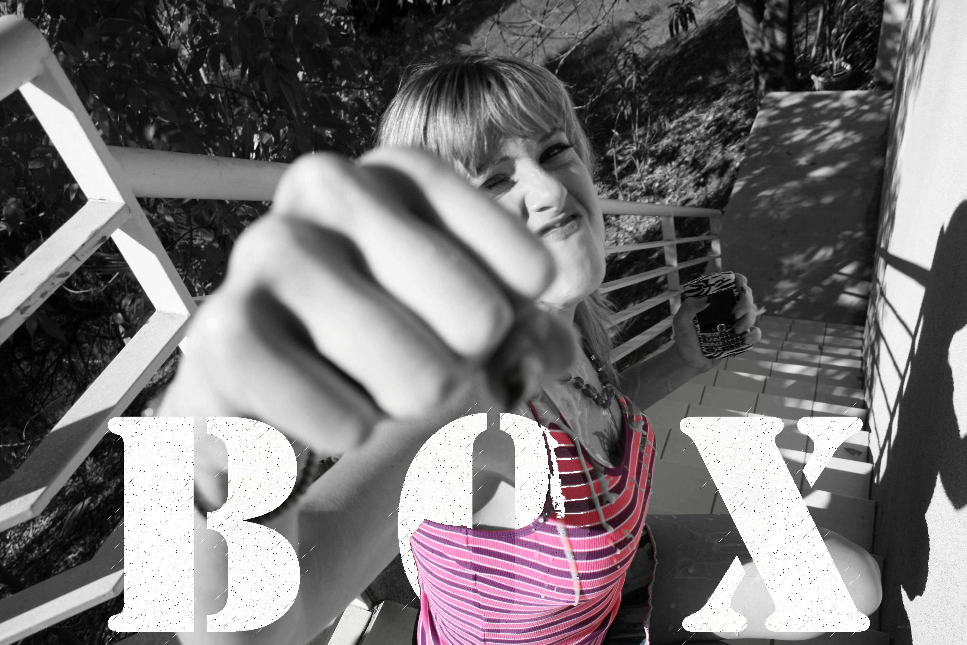 woman pointing at camera