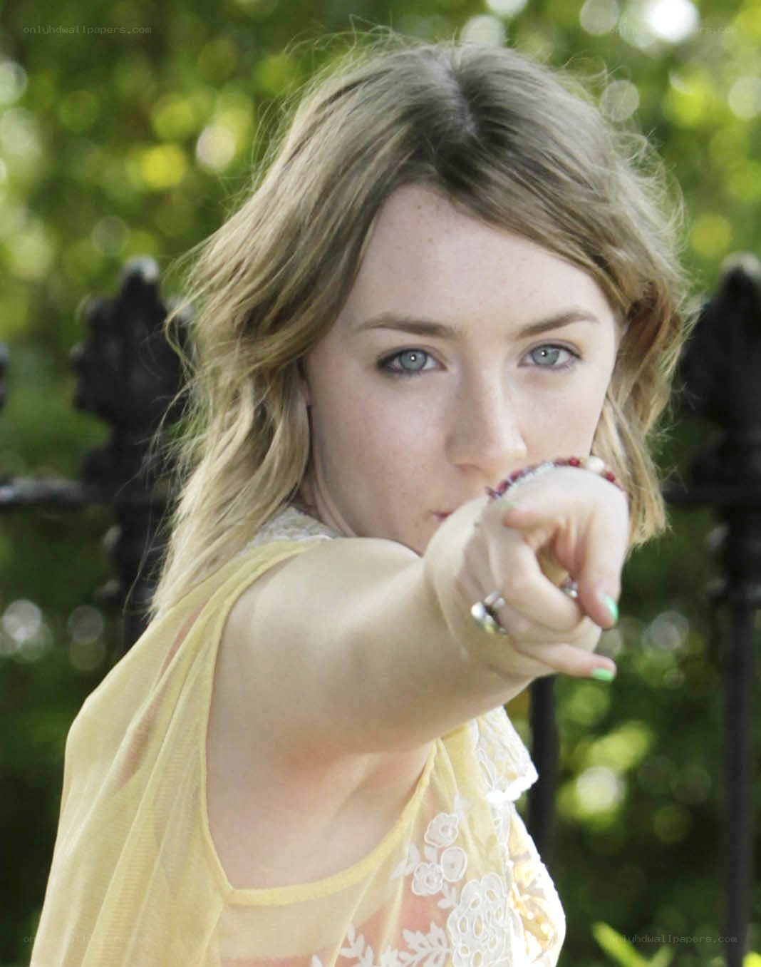 Woman pointing at camera