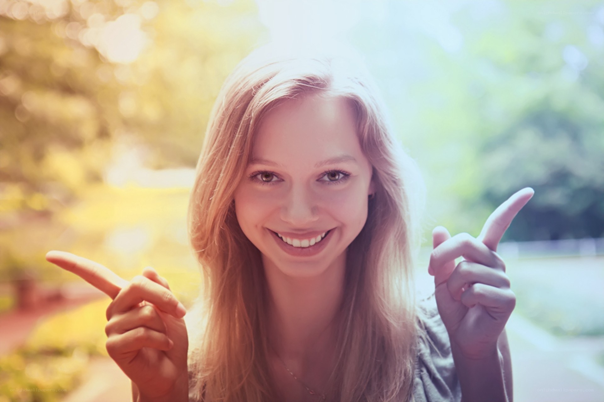 woman pointing at camera