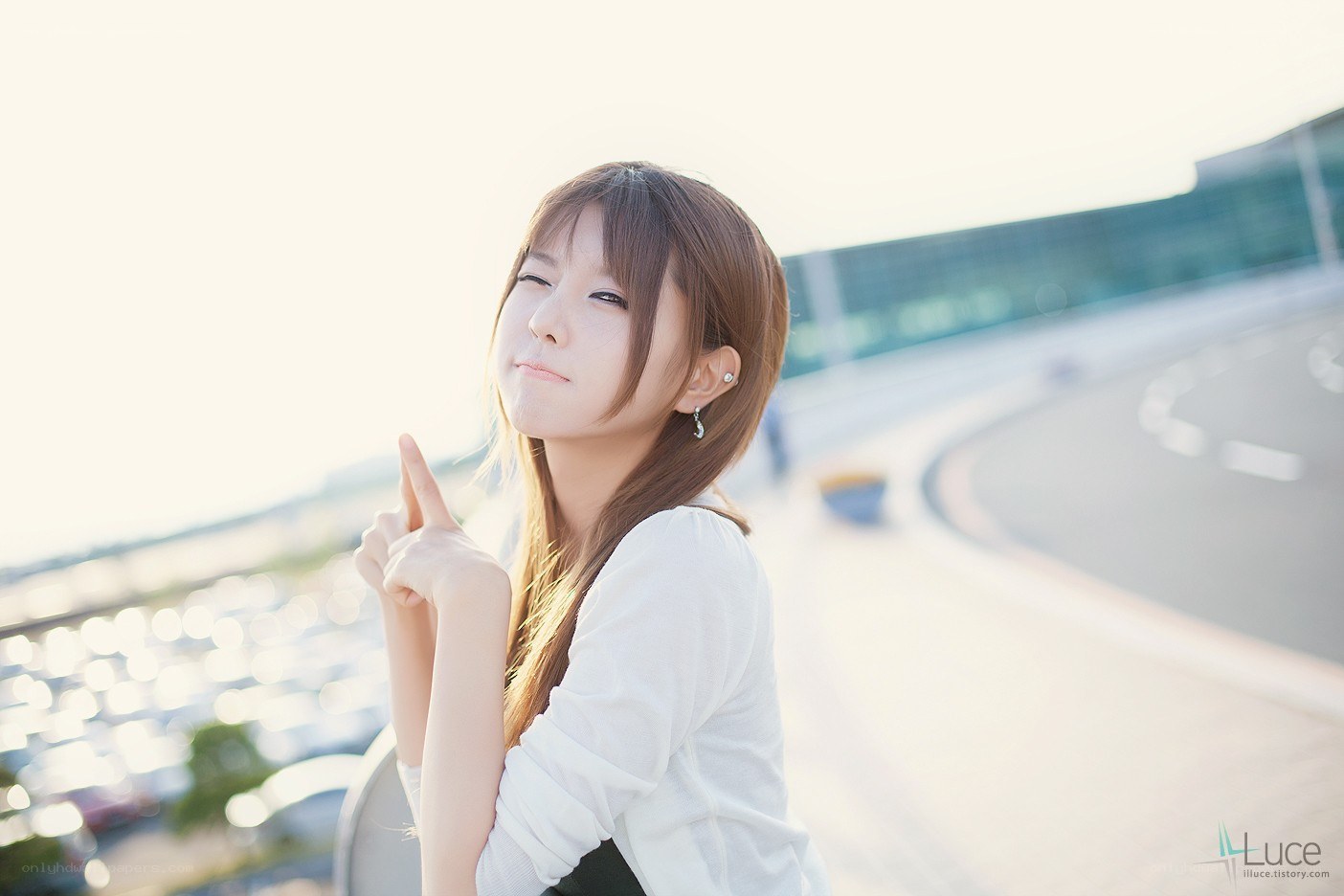 woman pointing at camera
