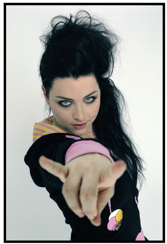 woman pointing at camera