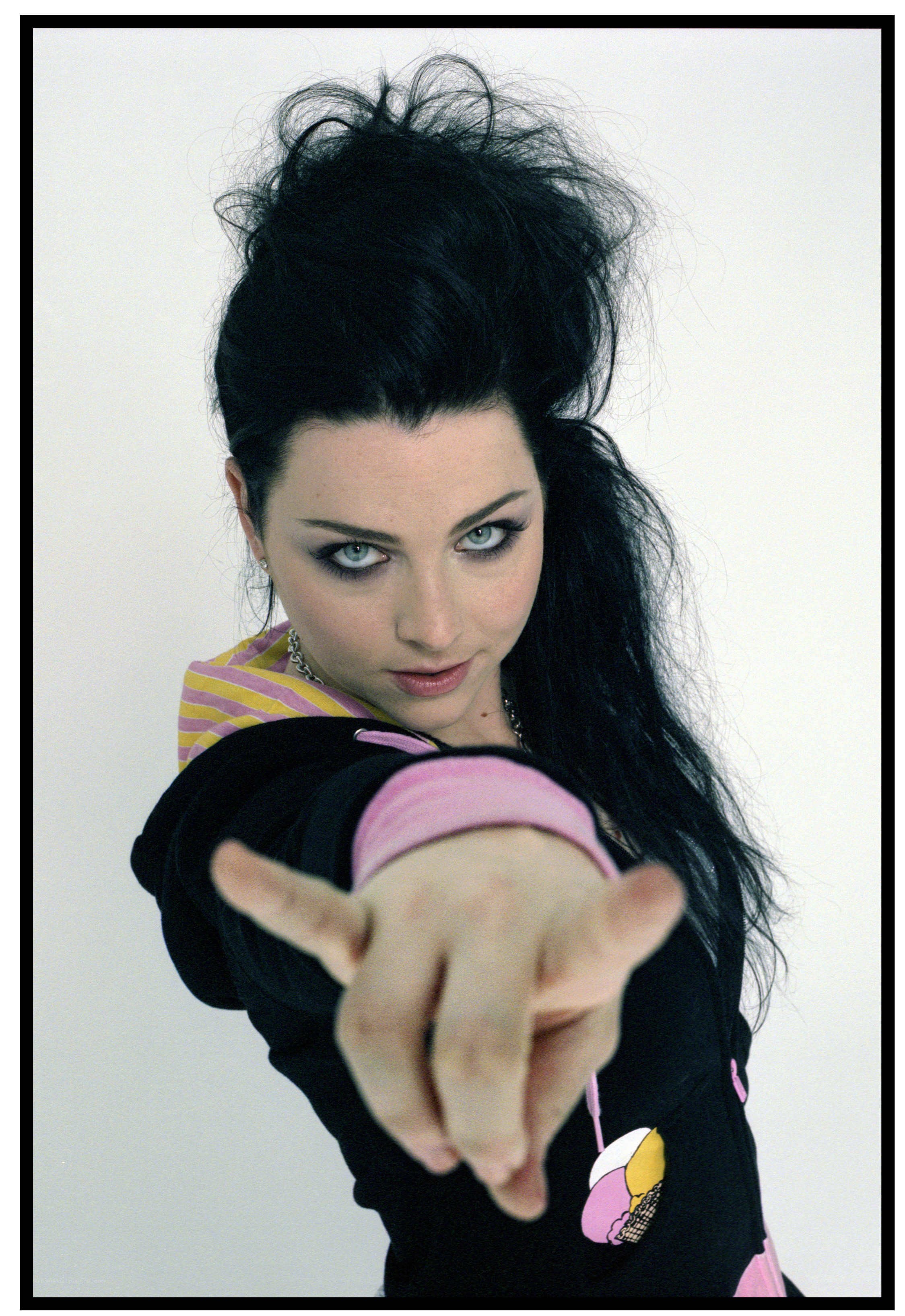 woman pointing at camera