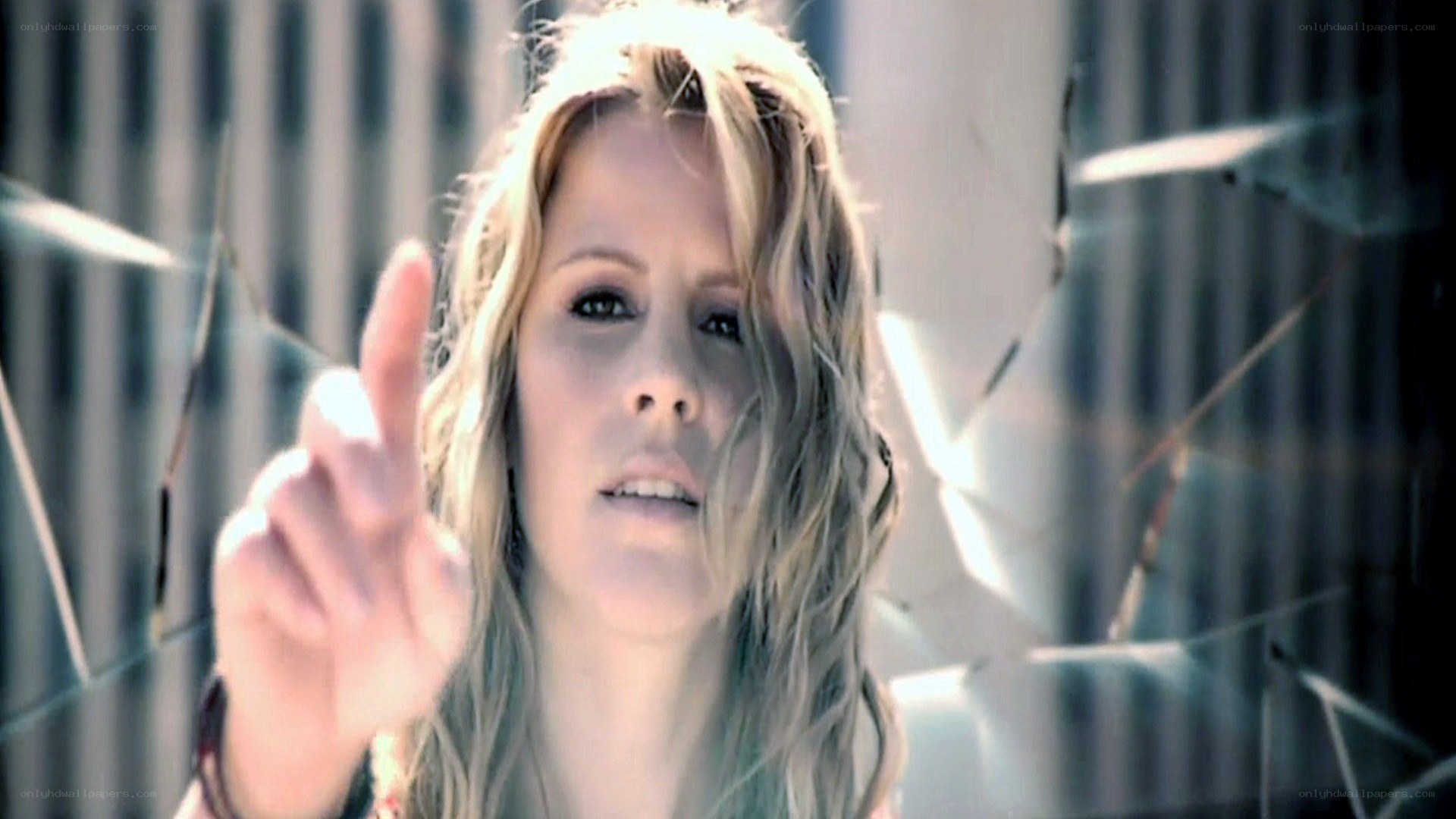 woman pointing at camera