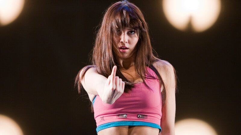 woman pointing finger on stage