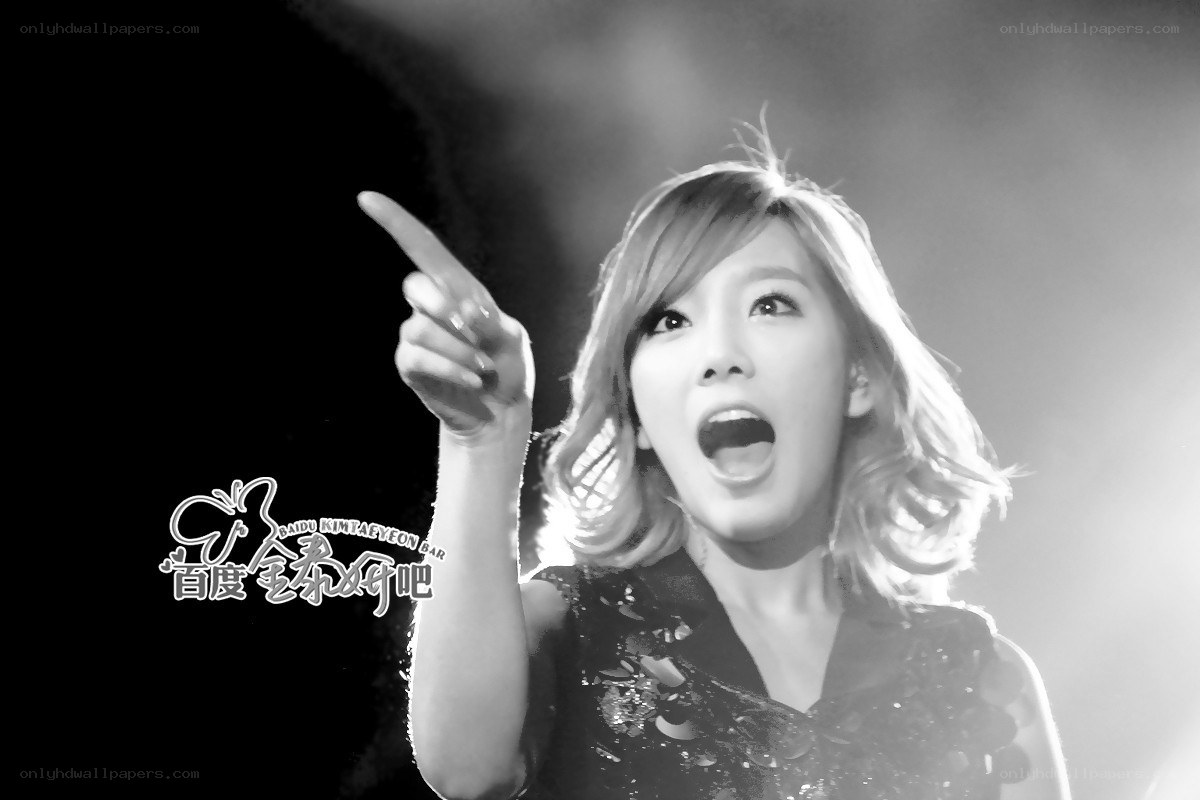 woman pointing on stage