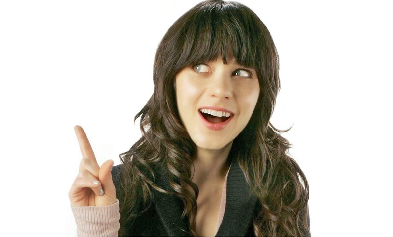 woman pointing up with smile