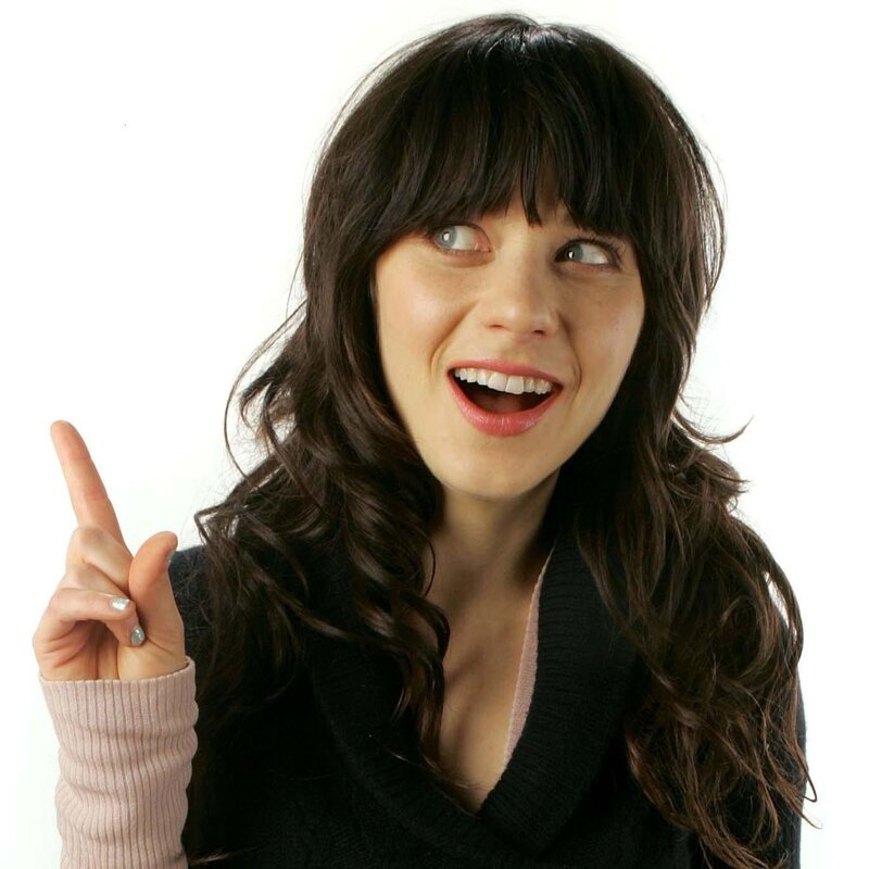 woman pointing up with smile