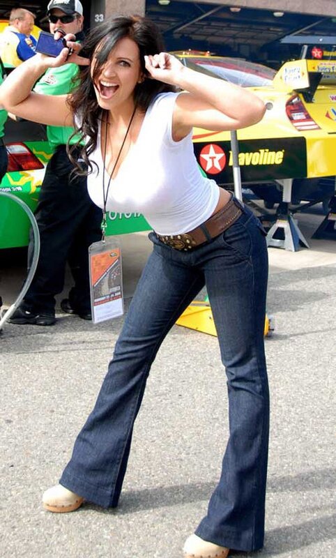 Woman posing at a race track