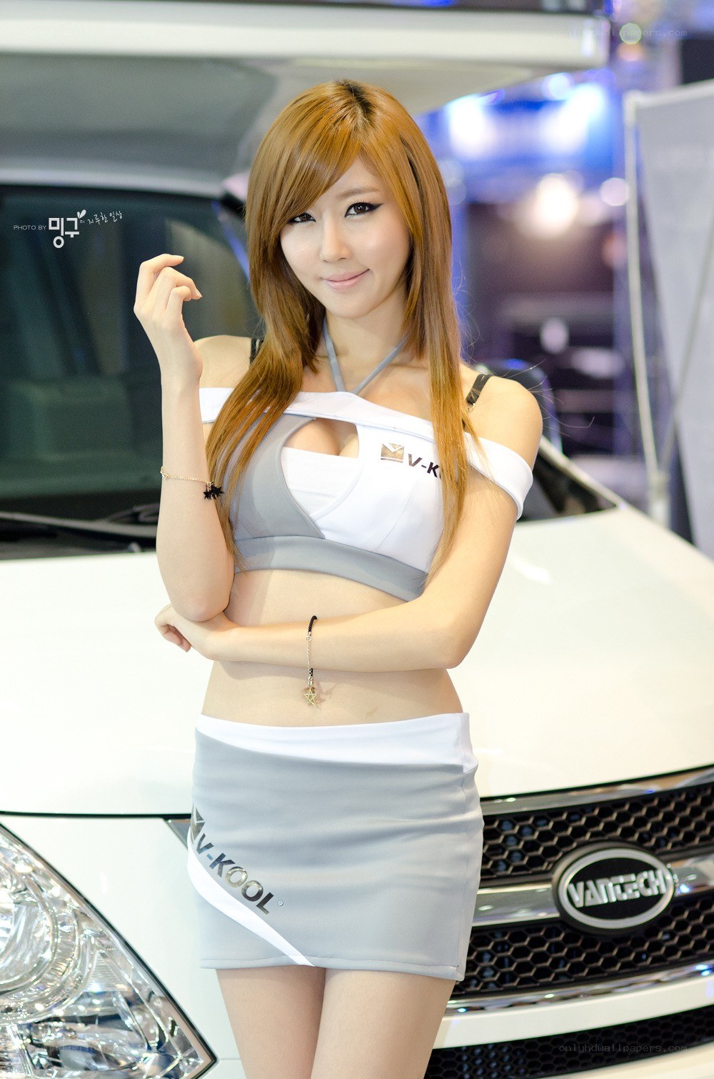 Woman posing at auto show