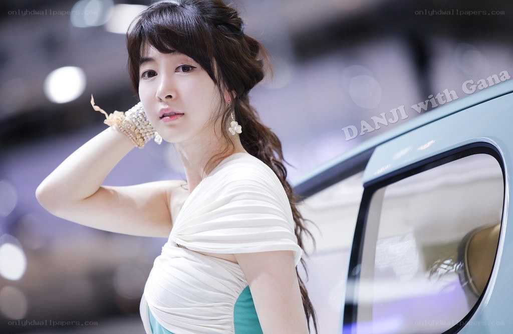 Woman posing at auto show