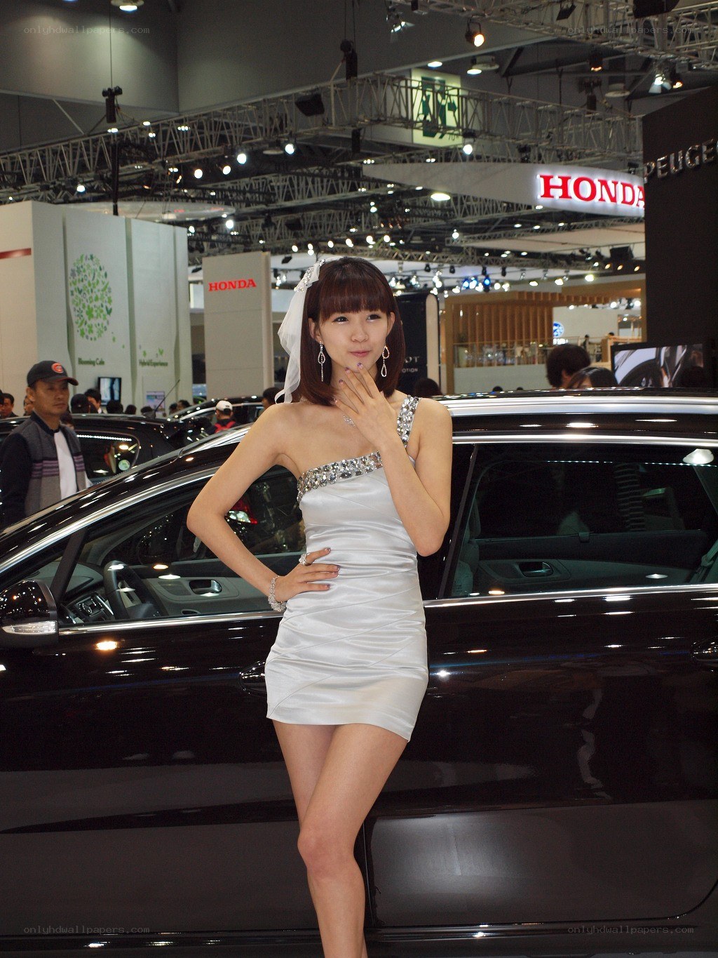 Woman posing at auto show