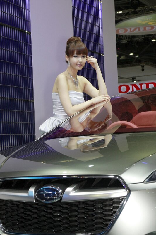 Woman posing at car show
