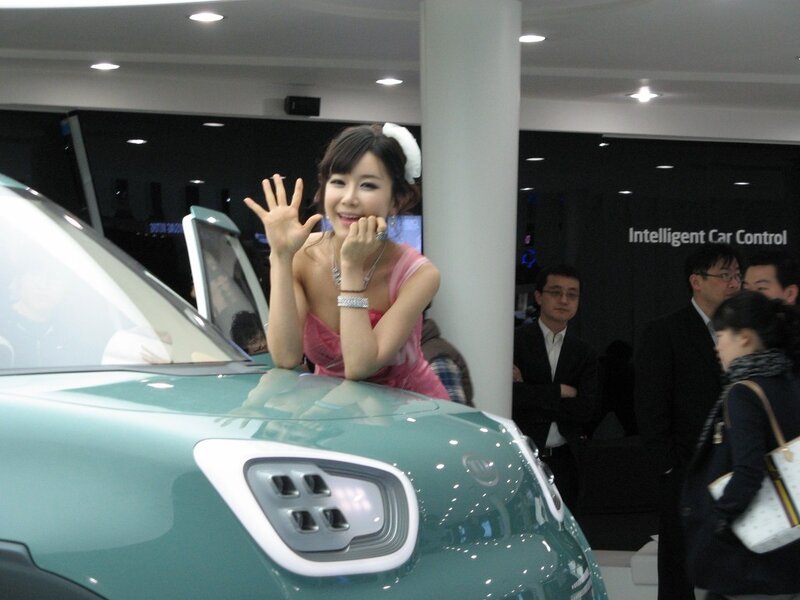 Woman posing at car show
