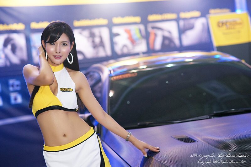 Woman posing at car show