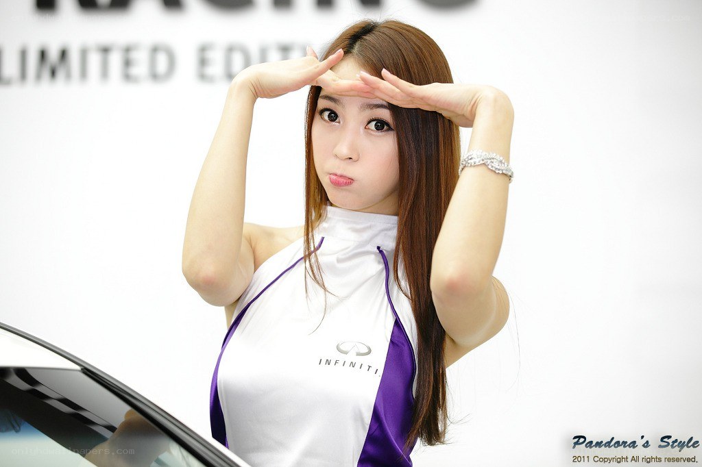 woman posing at car show