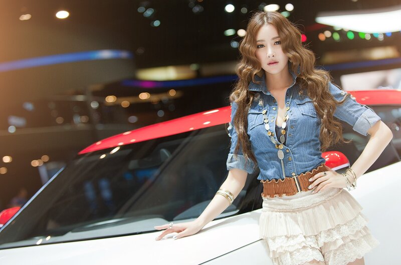 Woman posing at car show