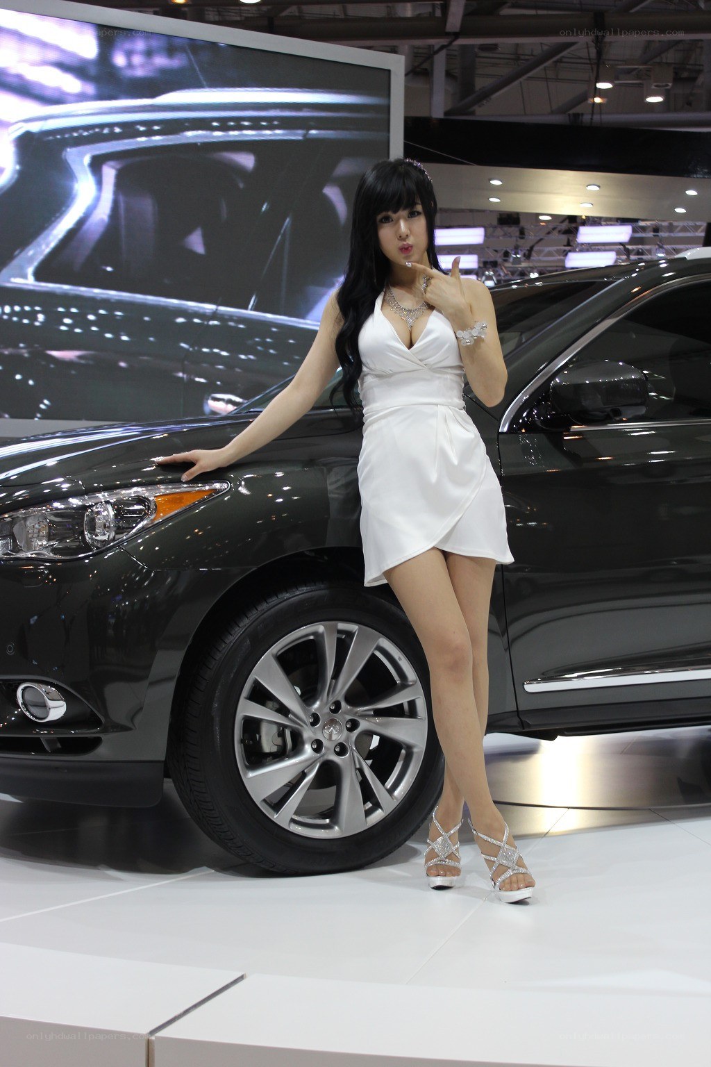 Woman posing at car show