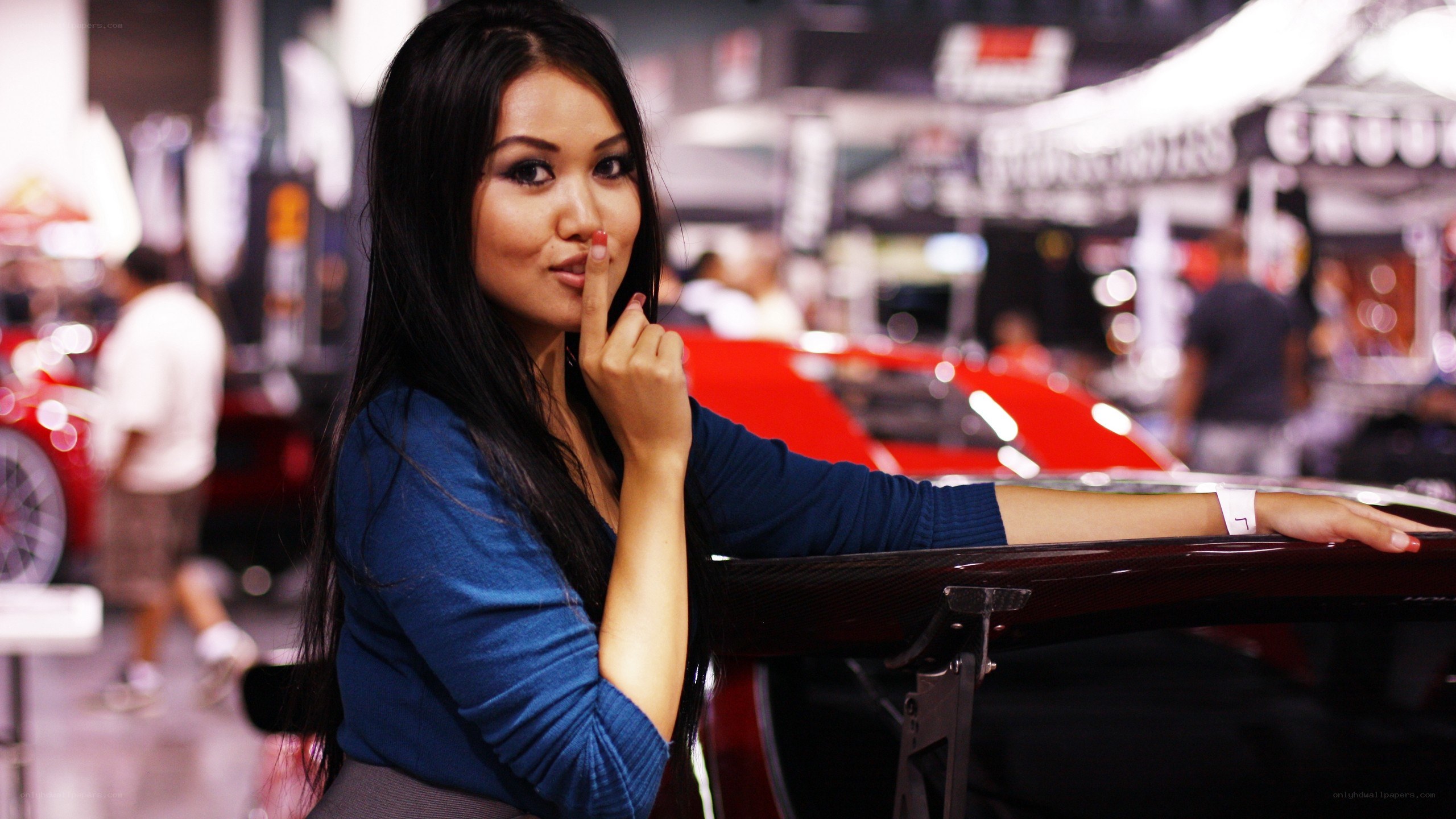 Woman posing at car show