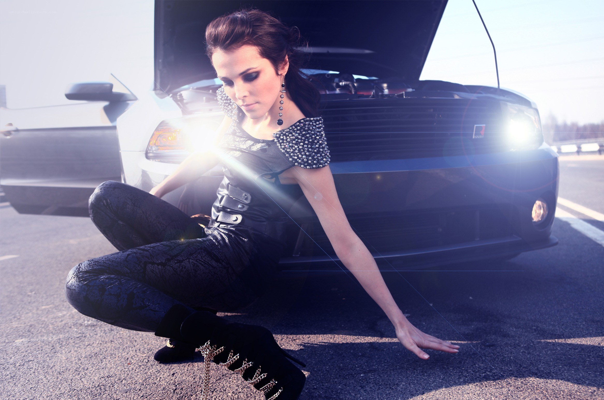 woman posing by car