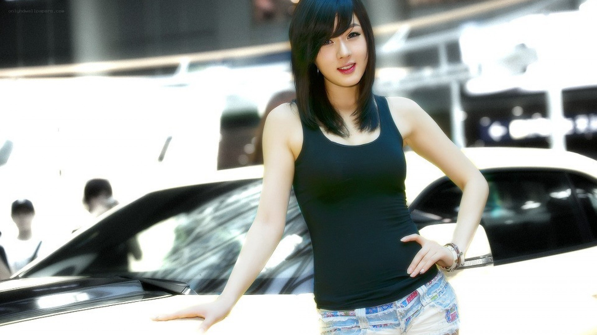 woman posing by car