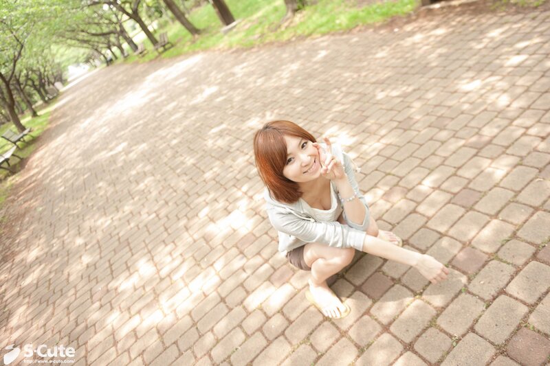 Woman posing on a park path