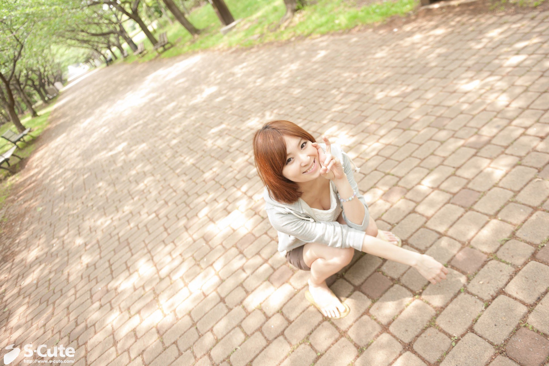 Woman posing on a park path