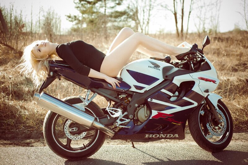 woman posing on motorcycle