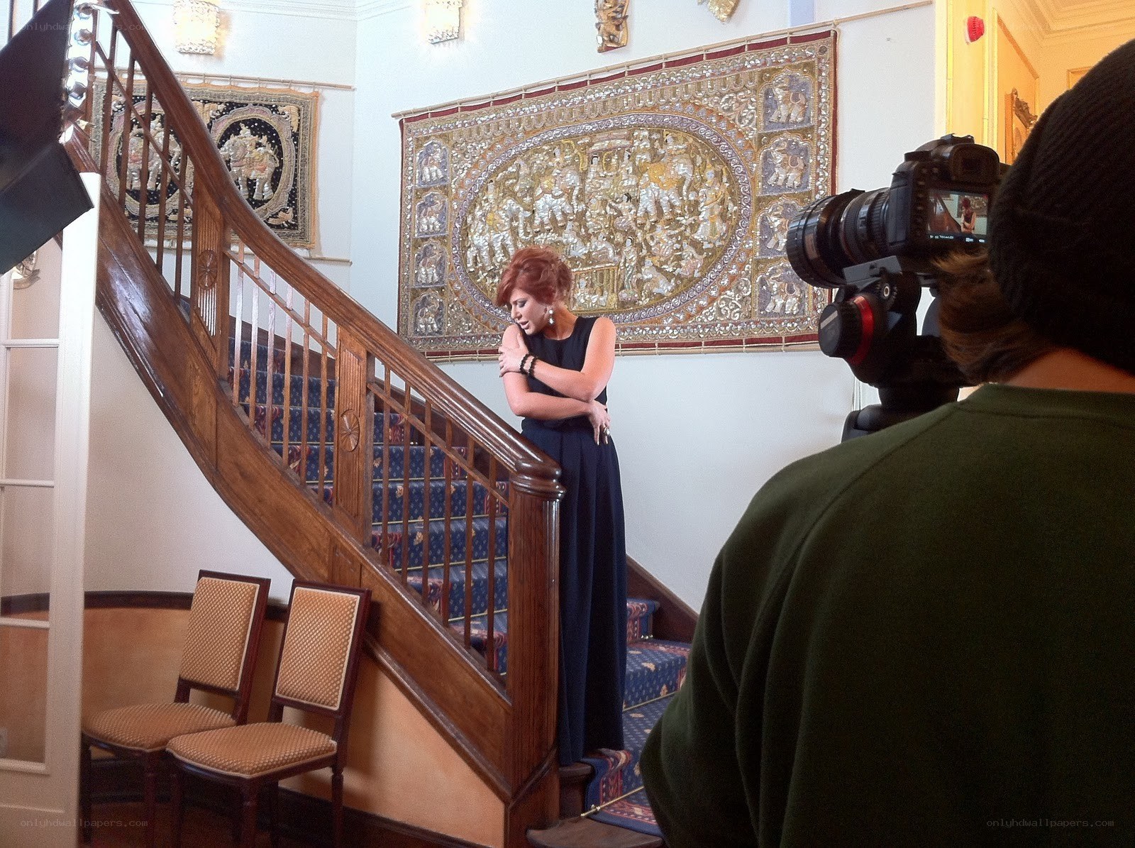 woman posing on staircase