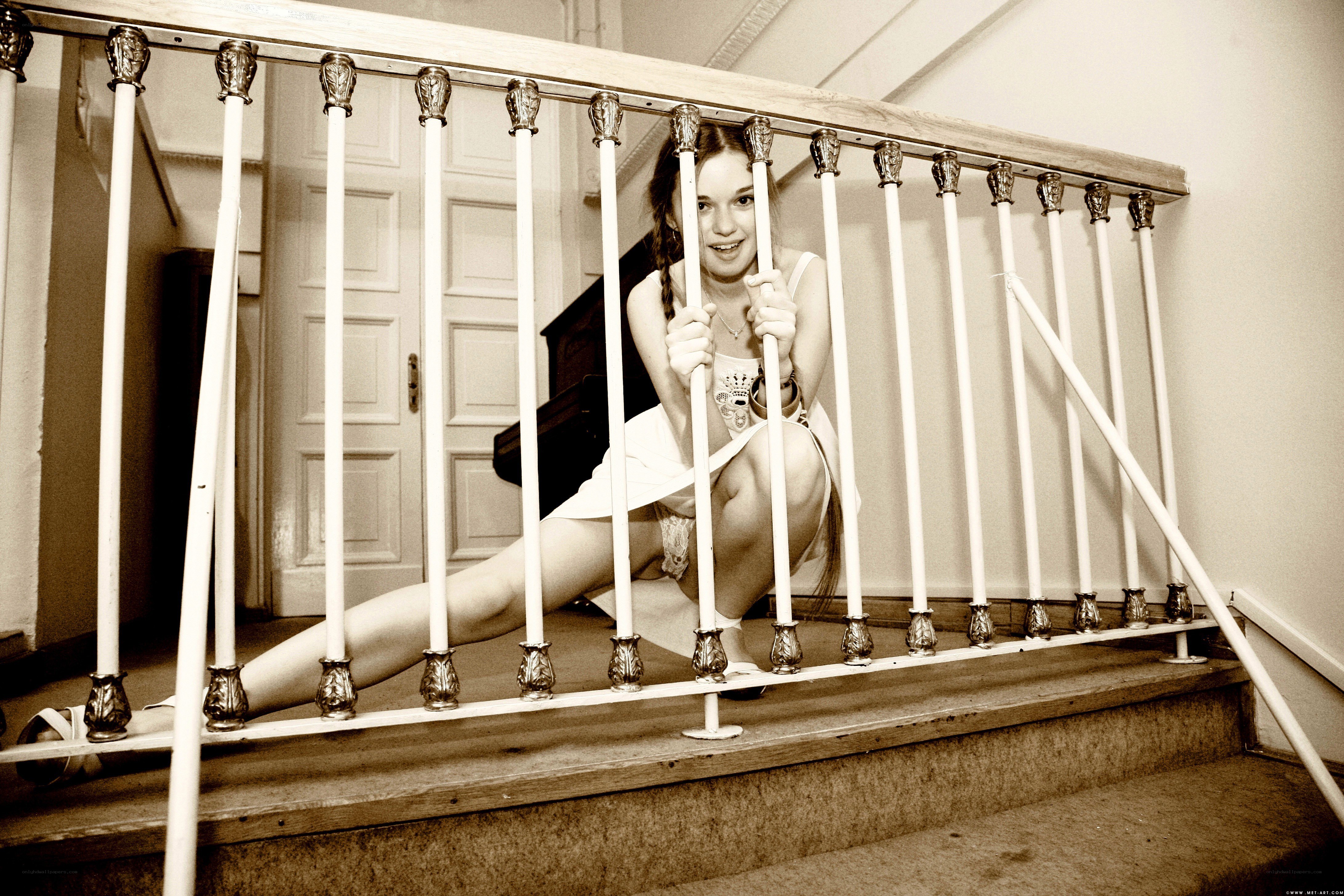 woman posing on staircase