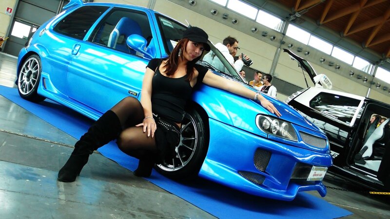 Woman Posing with Blue Car — Dramatic, Afternoon
