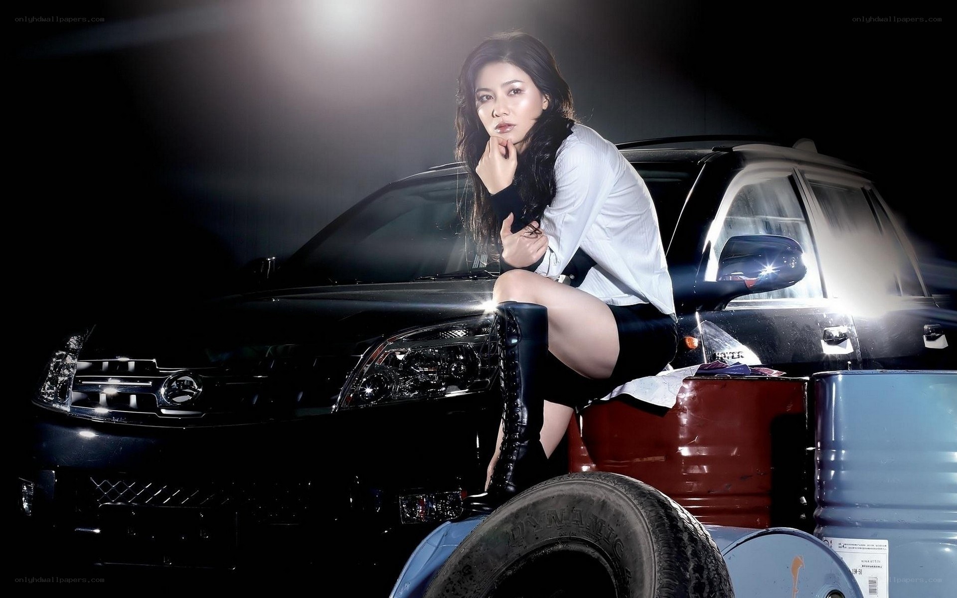 woman posing with car