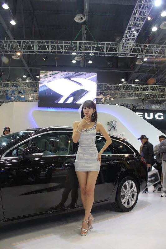 Woman Posing with Car — Black, Neutral, Photograph, Screen