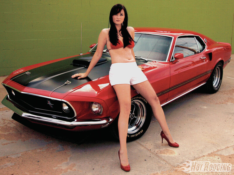 Woman Posing with Car — Red, Confident