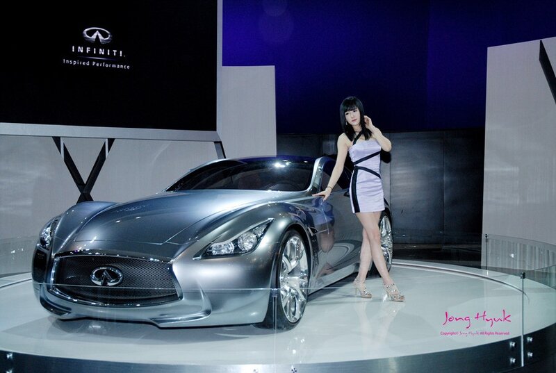 Woman Posing with Car — Silver, Dramatic, Photograph, Model