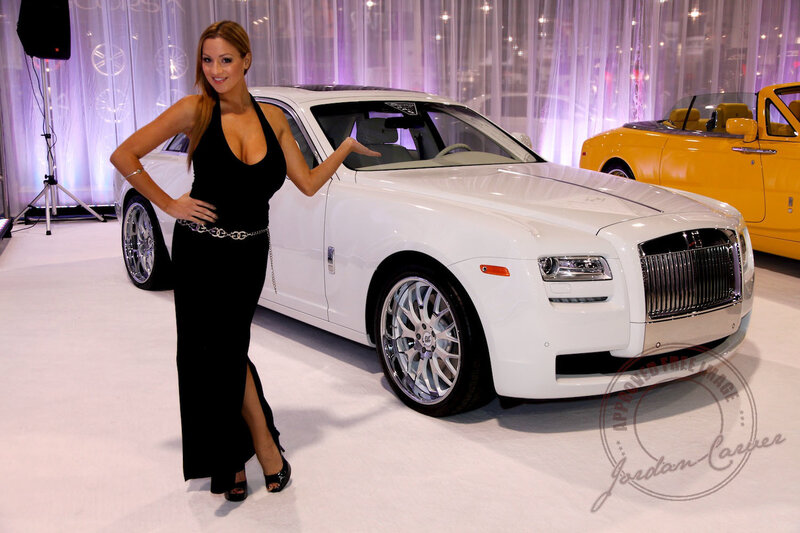 Woman Posing with Car — White, Showroom