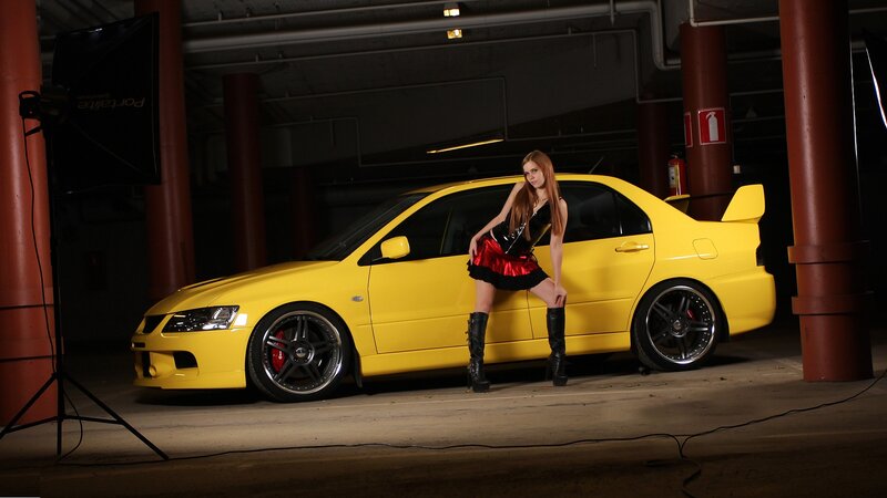 Woman Posing with Car — Yellow, Dramatic, Night, Photograph