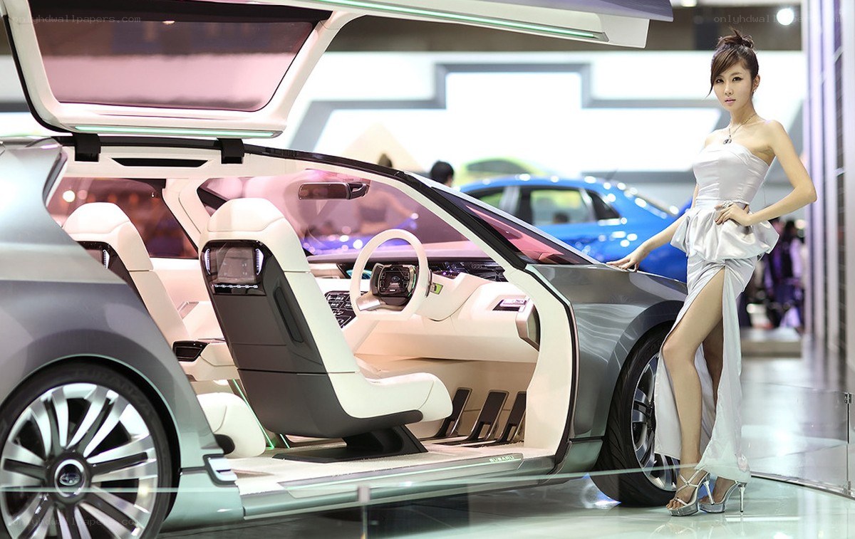 Woman posing with concept car