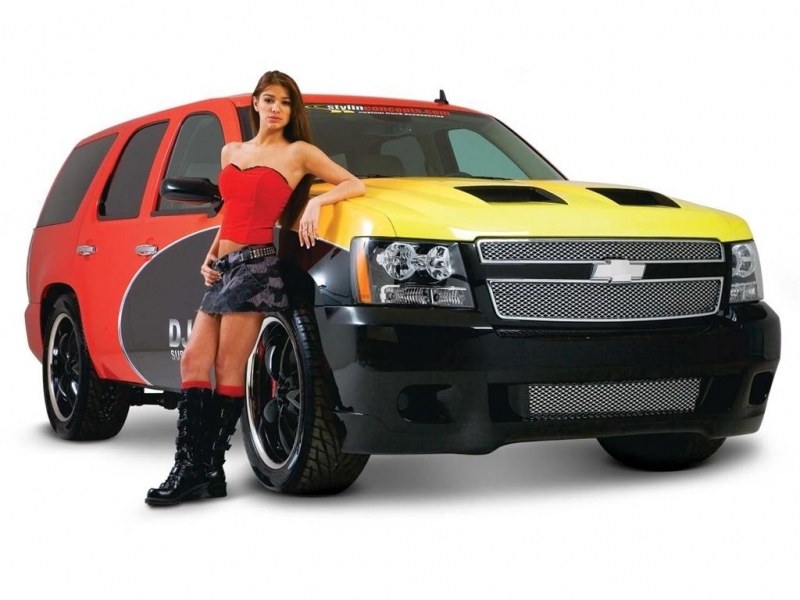 woman posing with customized suv
