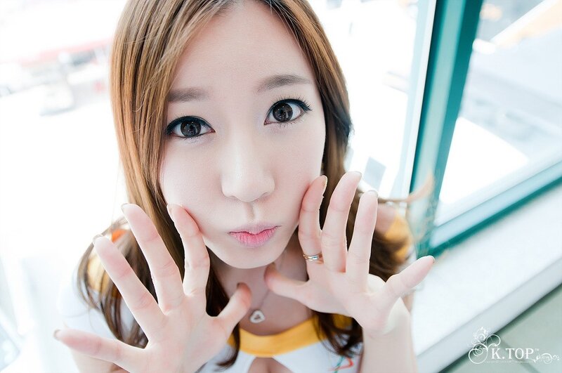 woman posing with hands near face