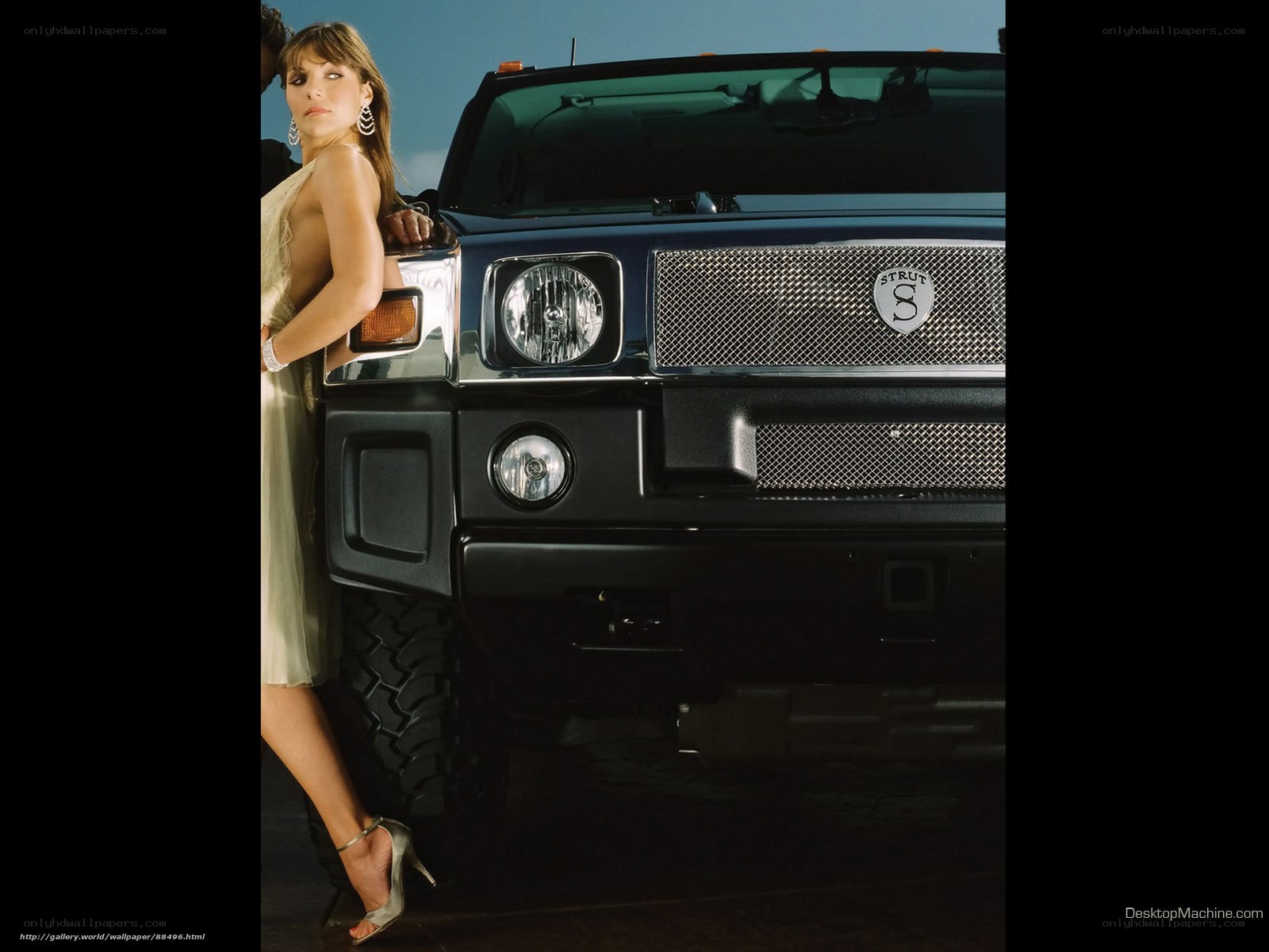 woman posing with hummer