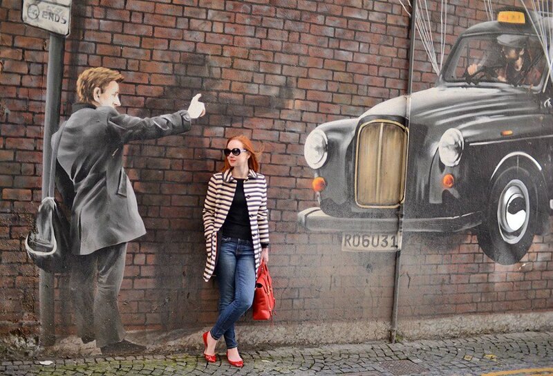Woman Posing with Mural — Red
