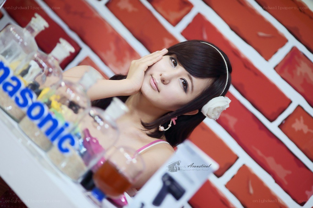 woman posing with panasonic bottles
