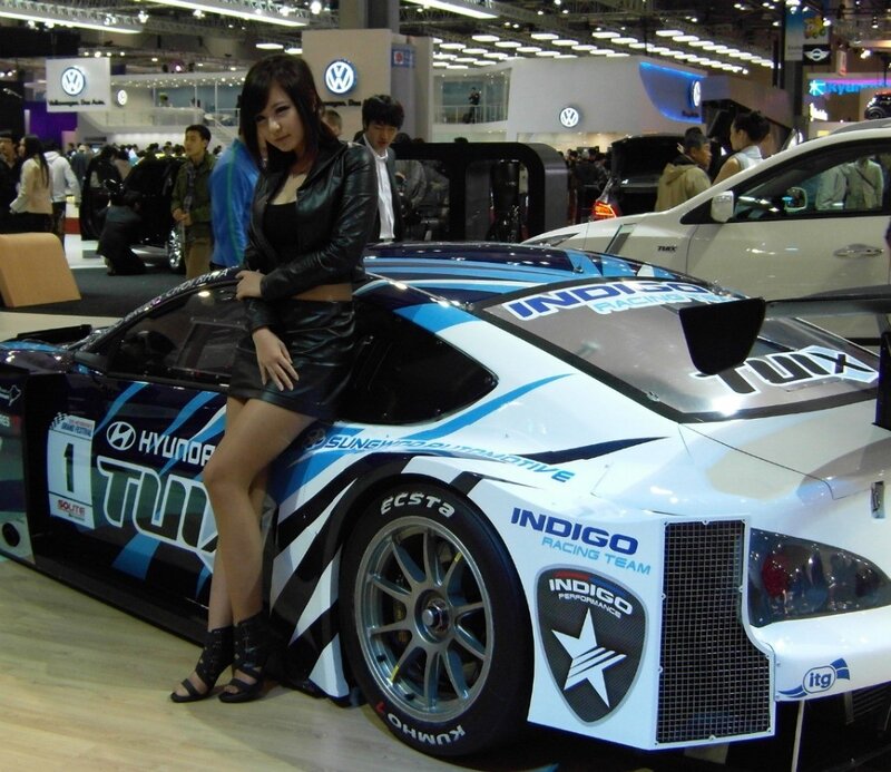 Woman Posing with Race Car — White