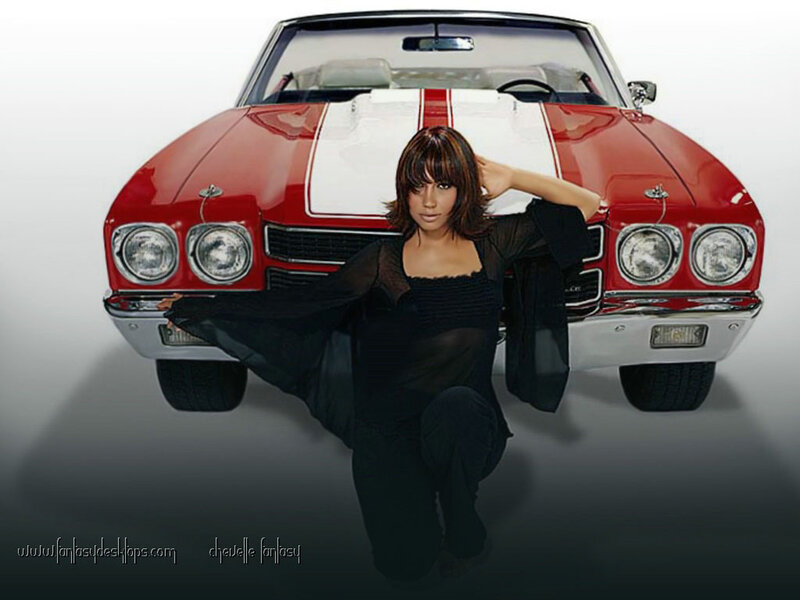 woman posing with red car
