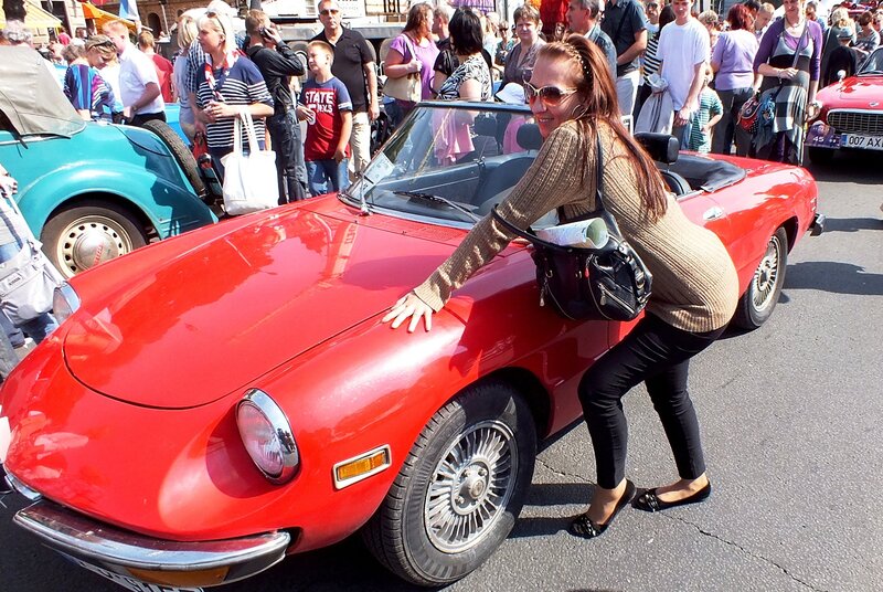 Woman Posing with Red Car — Lively