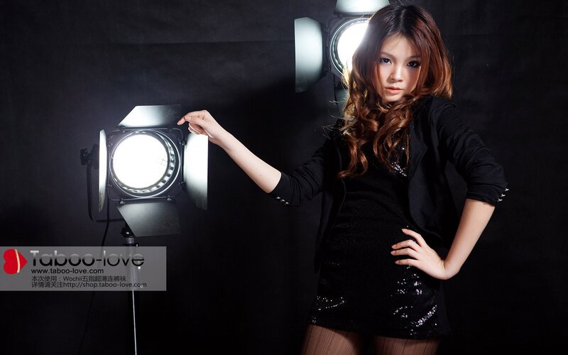woman posing with studio light