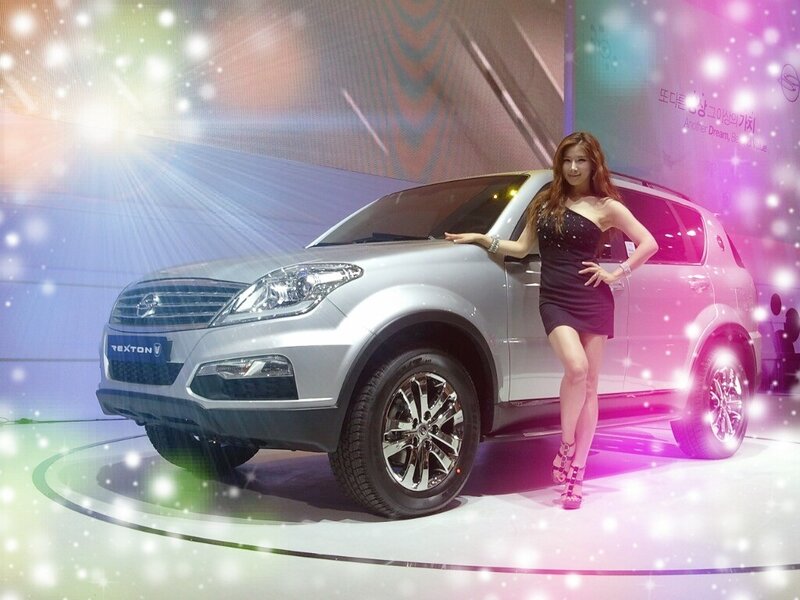 Woman Posing with SUV