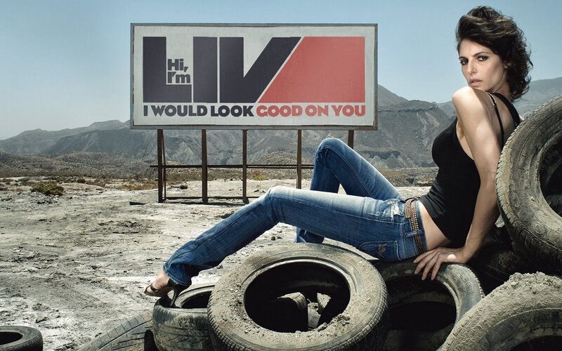 Woman posing with tires