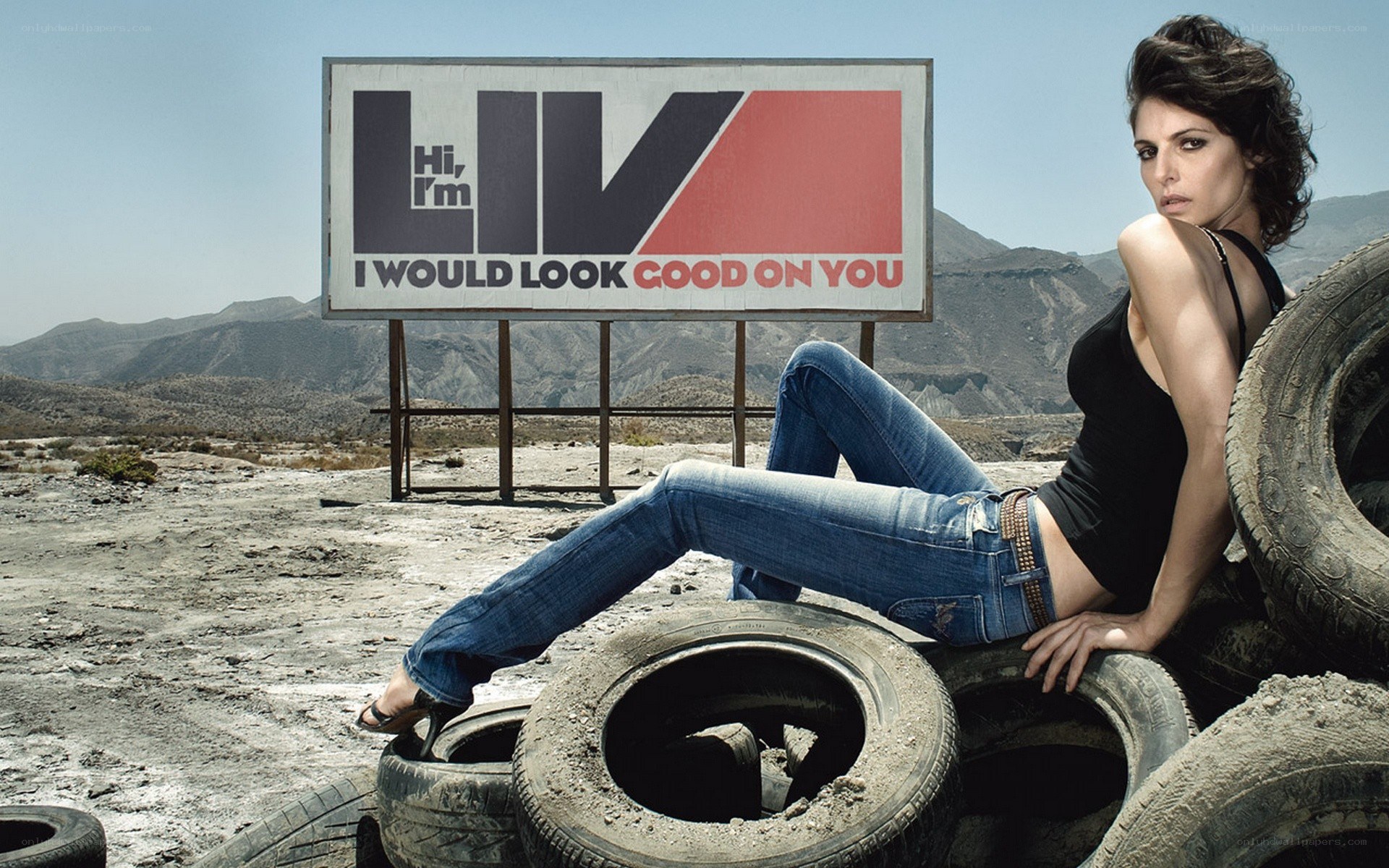 Woman posing with tires