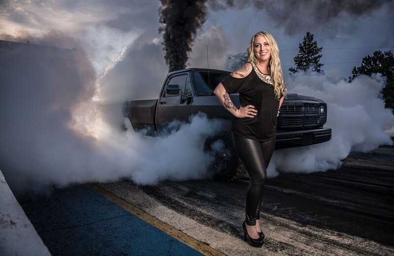 Woman Posing with Truck — Black, Dramatic